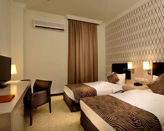 City Hotel Duqm - Duqm - Спальня
