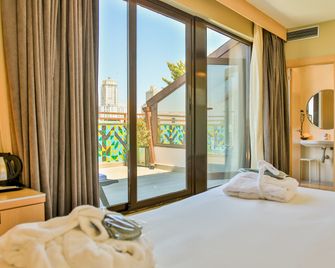 فندق أوبرا - مدريد - غرفة نوم