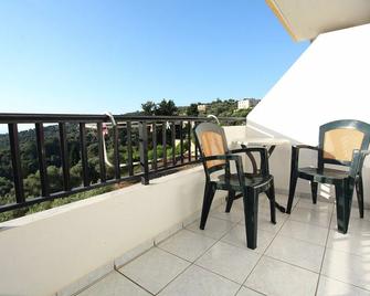 Argiroupolis Maria Rooms - Argyroupoli - Balcón