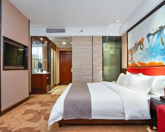 Hengxin Business Hotel (Dongguan Houjie Wanda Plaza) - Dongguan - Schlafzimmer