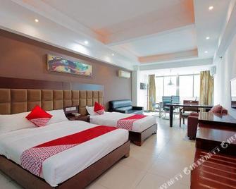 Ouya Hotel - Lingshui - Schlafzimmer