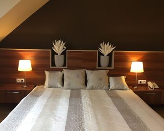 Alfa Hotel - גיור - חדר שינה