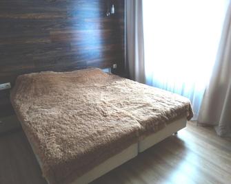 Sloboda Hotel - Tomsk - Slaapkamer