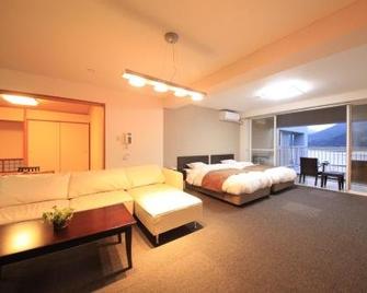 Reyzenit Kinosaki Suite Villa - Toyooka - Спальня