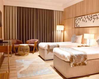 Midan Hotel & Suites Al Aziziya - Mecca - Bedroom