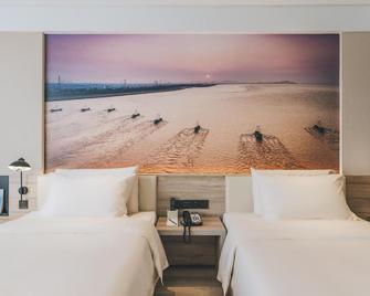 Atour Hotel Haining Leather City South Gate - Ťia-sing - Ložnice