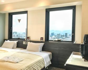 Hotel Livemax Hiroshima Funairimachi Riverside - Хірошіма - Спальня