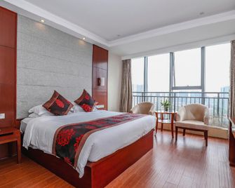 Ningbo Urban Elite Hotel (Yinzhou Wanda Plaza, Lishashang International Airport) - Ningbo - Bedroom