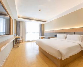 Xinchengjiudian - Lianyungang - Bedroom