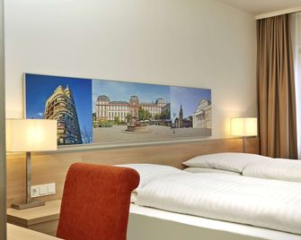 H+ Hotel Darmstadt - Darmstadt - Slaapkamer