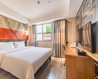 Suining Yisi Hotel - Suining - Schlafzimmer