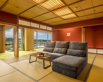 Ooedo Onsen Monogatari Wanwan Resort Awazu - Komatsu - Huiskamer