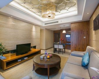Fogoda cinema apartment (Ningbo Tianyi Square drum shop) - Ningbo - Living room