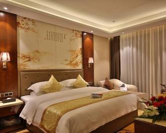 Wangfu Hotel - Jingmen - Schlafzimmer