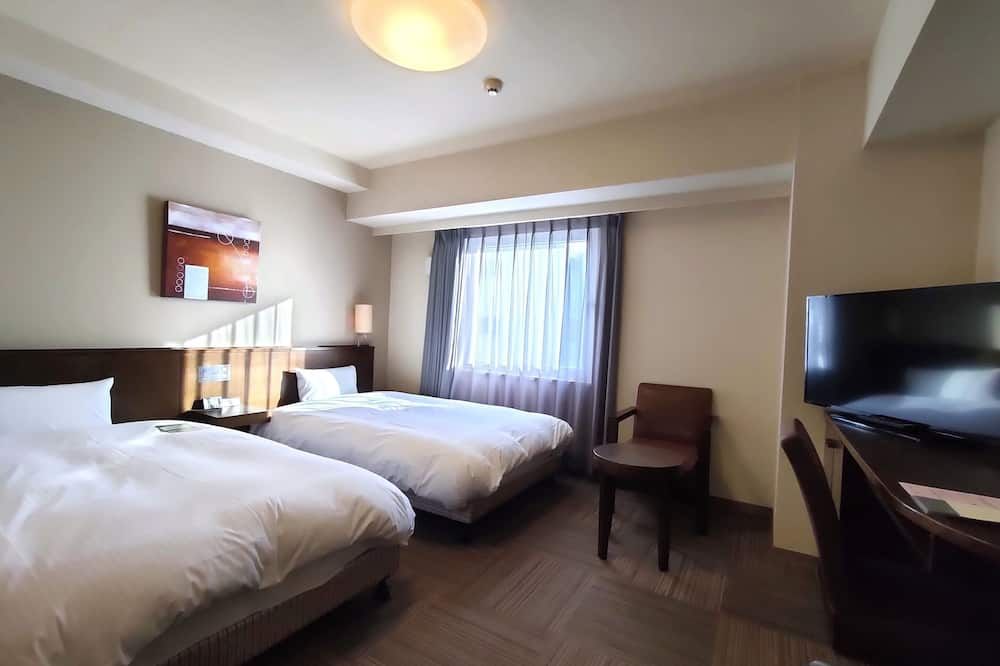 هوتل روت إن ميازاكي تاكيبانا دوري - ميازاكي - غرفة نوم