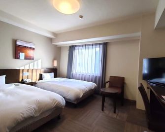 هوتل روت إن ميازاكي تاكيبانا دوري - ميازاكي - غرفة نوم