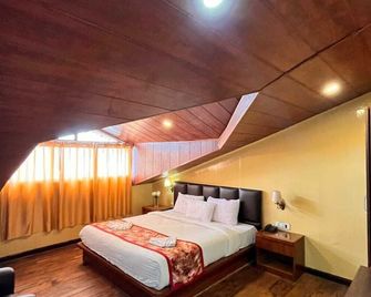 New Mandala Mahalsha Spa & Resort - דאריילינג - חדר שינה
