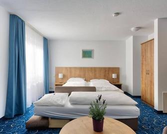 Appartis - Hotel am Stadtpark - Sindelfingen - Schlafzimmer