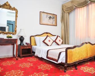 Tan Son Nhat Hotel - Ho Chi Minh City - Yatak Odası