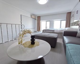Moye Loft Homestay (Xinglong Branch) - Фушунь - Спальня