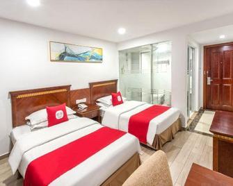 Nantong Guodu Hotel - Nantong - Schlafzimmer