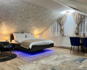 Prestige Aparthotel Brasov - Braşov - Phòng ngủ