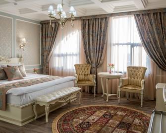 Aster Hotel Group - Taskent - Habitación