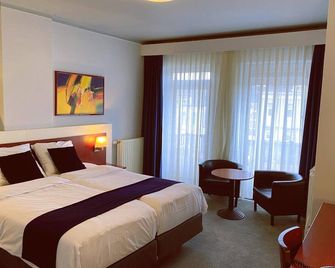 Apollo Hotel - Nimwegen - Schlafzimmer