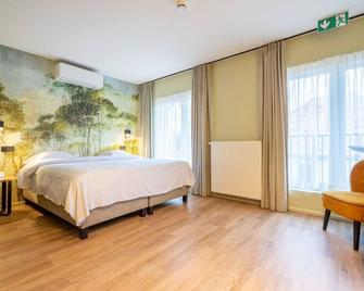 Appart hôtel En Ville - Bastogne - Bedroom