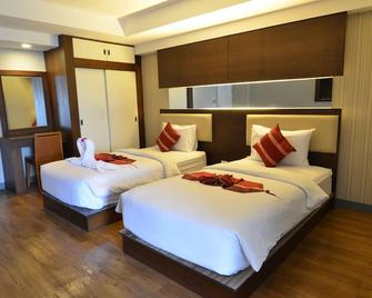 Tara Garden Hotel - בנגקוק - חדר שינה