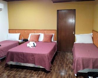 El Uru Suite Hotel - Puerto Iguazú - Ložnice
