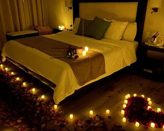 hotel villa murano - סן קריסטובל דה לס קאסאס - חדר שינה