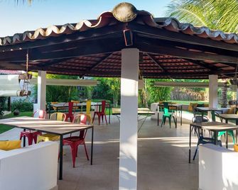 Pousada Charmosa, Aconchegante e Tranquila a 5 min de pé da Praia - סאו מיגל דו גוסטוסו - מסעדה