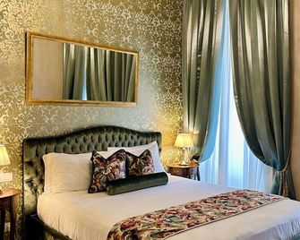 Palazzo Monga Boutique Guesthouse - Verona - Makuuhuone