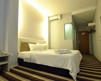 First Residence Hotel Kemaman - Chukai - Schlafzimmer