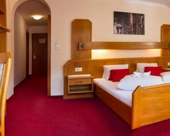 Hotel Simmerlwirt - Wildschönau - Soveværelse