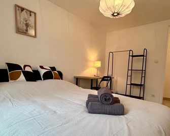 Les suites de Saint-Yves - Autun - Schlafzimmer