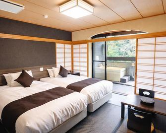 Livemax Resort Okudogo - Matsuyama - Bedroom