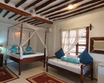 Excecutive Annex Matemwe - Kigomani - Chambre