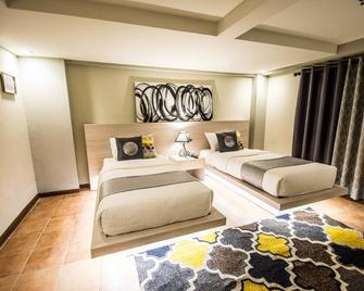 Almont City Hotel - Butuan - Camera da letto