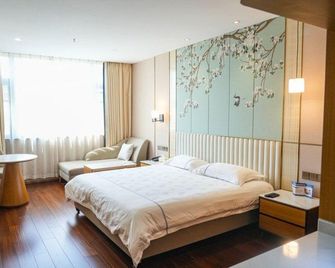 Nanjing Nanlian Hotel - نانجينغ - غرفة نوم