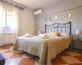 Casa Rural Los Mayorales II Apartamento - La Garrovilla - Camera da letto