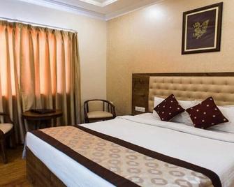 Wingston A Treehouse Hotel - Mathura - Mathura - Bedroom