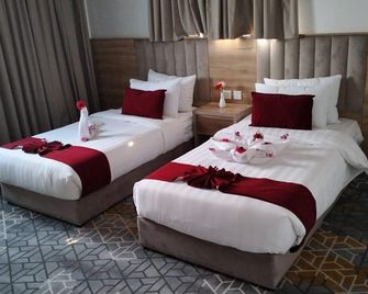 Golden New Umu Alquraa Hotel - Jeddah - Bedroom