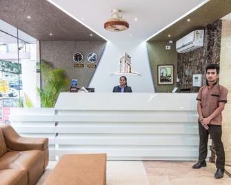 The Porch Inn Hotel/Service Apartments - Bengaluru - Front desk