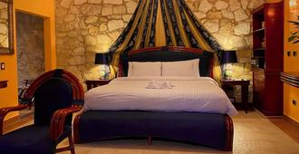 Boutique Hotel Quinta Chanabnal - פלנקה - חדר שינה