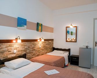 Narkissos Hotel - קאמארי - חדר שינה