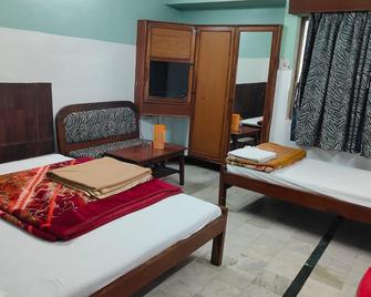 Hotel Yashoda International Deoghar - Deoghar - Bedroom