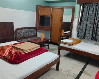 Hotel Yashoda International Deoghar - דאוגהאר סאדאר - חדר שינה