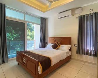 Grand Residency & Resort - Varkala - Bedroom